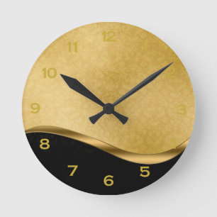 Horloge ronde en acrylique noir et or