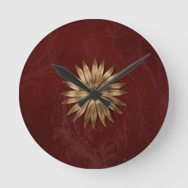 Horloge Ronde Fleur métal or sur tissu rouge
