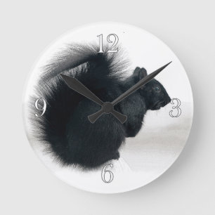 Horloge Ronde Jeune écureuil en hiver