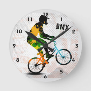 Horloge Ronde Le cavalier de BMX en peinture abstraite