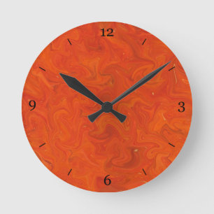 Horloge Ronde Le résumé tonal orange rouge a tourbillonné