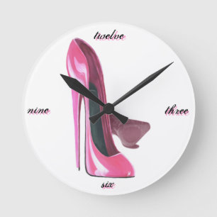 Horloge Ronde Le stylet rose chausse l'art