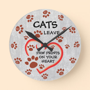Horloge Ronde Les chats laissent des Empreintes de pattes sur vo