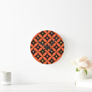 Horloge Ronde Mi-siècle étoiles atomiques sur les cercles orange