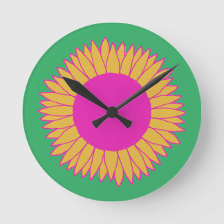 Horloge Ronde Neon rose et orange sur tournesol vert