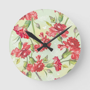 Horloge Ronde Oeillets rouges sur le vert avec des papillons