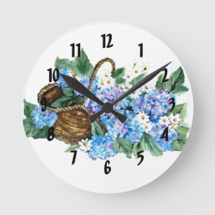 HORLOGE RONDE PANIER AVEC DES HORTENSIAS