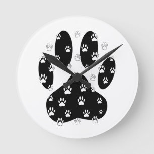 Horloge Ronde Paquets blancs sur l'Empreinte de patte noir