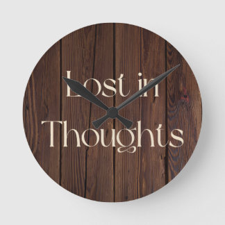 Horloge Ronde Perdu dans ses pensées