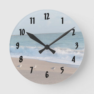 Horloge Ronde trois oiseaux sur la plage de la Floride de photo