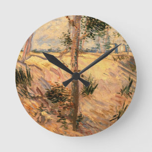 Horloge Ronde Un arbre dans un champ pendant la journée ensoleil