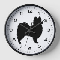 Silhouette de chien papillon avec chiffres et minu