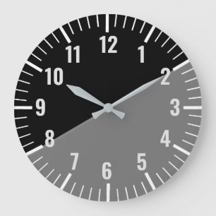 Horloge vintage noire et grise avec nombre