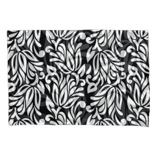 Housse D'oreillers Le textile noir et blanc.