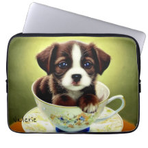 Jolie chiot dans une Tea up