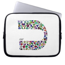 Lettre hébraïque 'CHAF' faite avec des pierres pré