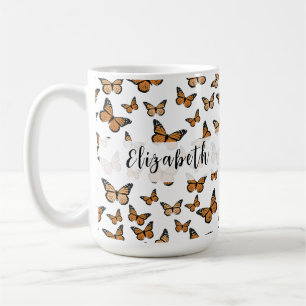 Hübsche orange Schmetterlinge mit eigenem Namen Kaffeetasse