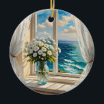 Hübsche Ozeanszene | Frohe Weihnachten Keramik Ornament<br><div class="desc">Eine hübsche Vase aus Blume auf einem Tisch vor einem Fenster mit Blick auf den Ozean. Schere weiße Vorhänge blasen in der Brise. Ai Art.</div>
