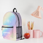 Hübsche Pastel Rainbow Sparkle Personalisiert Bedruckter Rucksack<br><div class="desc">Passen Sie diesen hübschen pastellfarbenen Regenbogenfunkel-Rucksack an,  der Ihren Namen in niedlich weißer Schrift wiedergibt. Dieses magische Design hat ein hübsches rosa und lila Muster für ein kleines Mädchen,  das als Büchertasche für die Schule benutzt wird.</div>