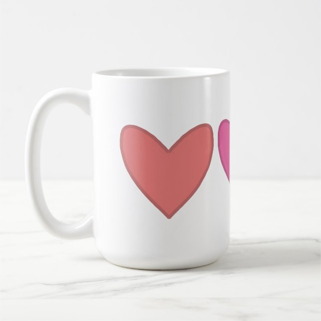 Hübsche rosa und pfirsichfarbene Herzen Kaffeetasse (Links)
