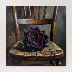 Hübsche schwarze Rose auf rustikalem Stuhl Valenti