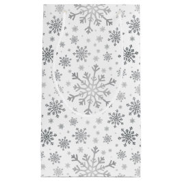 Hübsche Silberschneeflocken auf Winterweiß Kleine Geschenktüte