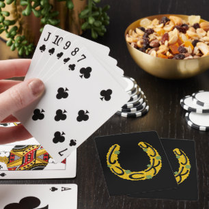 Hufeisen mit Goldmünzen und Kleeblättern bedeckt Spielkarten