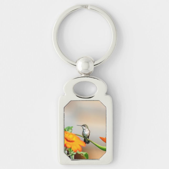 Hummingbird auf einer blühenden Pflanze Schlüsselanhänger (Vorderseite)