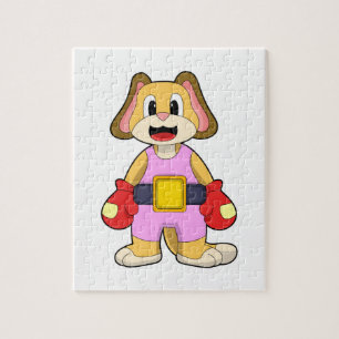 Hund beim Boxen mit Boxhandschuhen