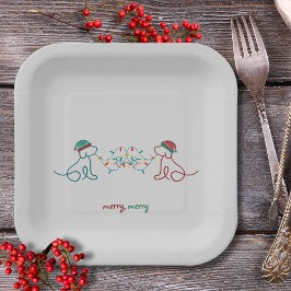 Hunde spielen mit weihnachtlicher Leuchte Papierpl Pappteller