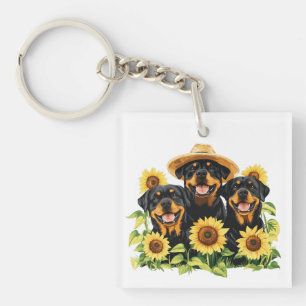 Hunde von Rottweiler, umgeben von Sonnenblumen Schlüsselanhänger
