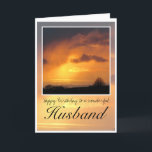 Husband Birthday, Bright Sun Dark Clouds. Karte<br><div class="desc">Happy Birthday Husband,  deep orange sun glowing d dark,  wispy rain clouds with black text saying,  'Happy Birthday to a wonderful husband'</div>
