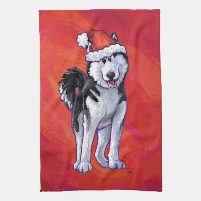 Husky in Weihnachtsmannmütze auf Rot Geschirrtuch (Vertikal)