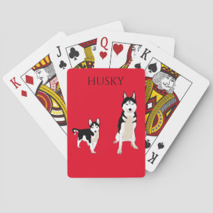 Husky spielt Karten. Spielkarten