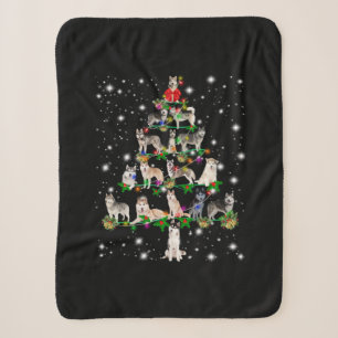 Husky Weihnachtsbaum, gedeckt von Blitzlicht Sherpadecke