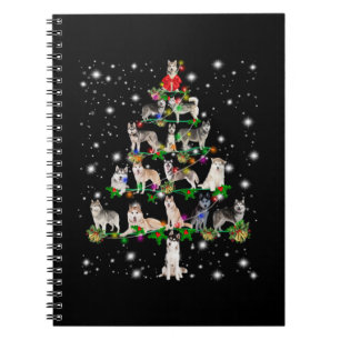Husky Weihnachtsbaum mit leuchtendem Licht bedeckt Notizblock