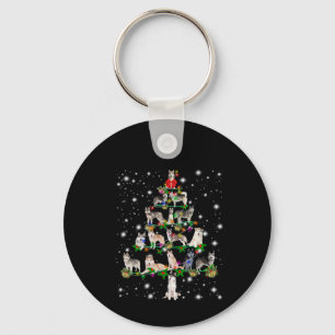 Husky Weihnachtsbaum mit leuchtendem Licht bedeckt Schlüsselanhänger