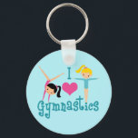 I Liebe Gymnastik Niedlich Gymnastik Schlüsselanhänger<br><div class="desc">Ich Liebe Gymnastik. Ein hübsches Gymnastikgeschenk mit bezauberndem aquamarinem Text zwischen zwei schwindelnden Mädchen und einem schönen rosa Herz. Ein niedliches Gymnastikgeschenk für Kinder oder Damen.</div>