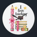 I love teaching reading teacher clock große wanduhr<br><div class="desc">Cute reading teacher design with pencil and books. Perfect for teachers who love helping students learn to read.</div>