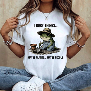 Ich begrabe Dinge, vielleicht Pflanzen, vielleicht T-Shirt