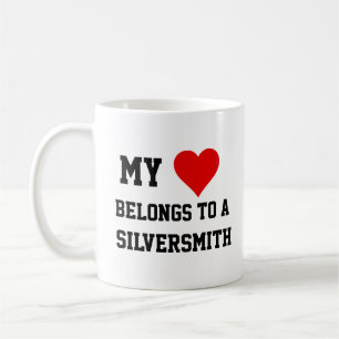 Ich gehöre einer Silberschmiede-Tasse an Kaffeetasse