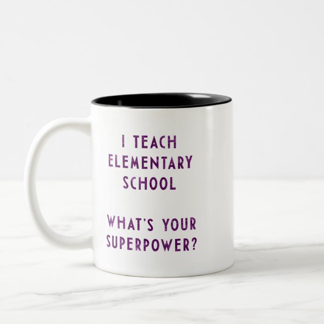 Ich lehre Grundschule Was ist deine Supermacht? Zweifarbige Tasse (Links)
