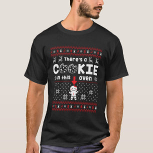 Ich setze einen Keks in den Ofen, in dem sich ein T-Shirt