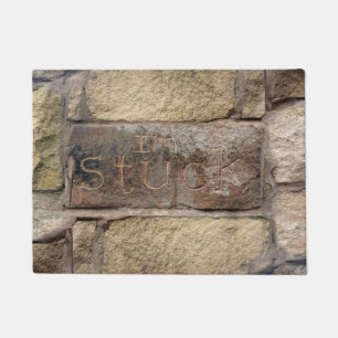 "Ich stecke fest" ein anderer Stein in der Wand Fußmatte