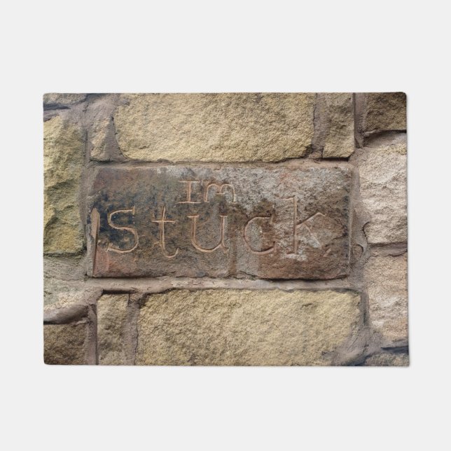 "Ich stecke fest" ein anderer Stein in der Wand Fußmatte (Vorderseite)