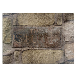 "Ich stecke fest" ein anderer Stein in der Wand Schneidebrett