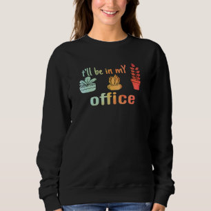 Ich werde in meinem Büro für Gartenarbeit sein Sweatshirt