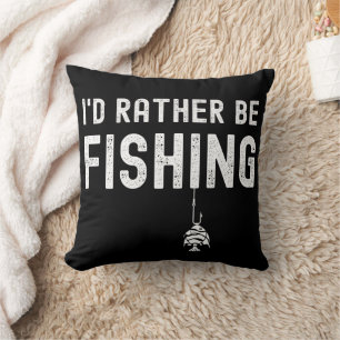 Ich würde eher das Kissen mit dem Fischteppich fis