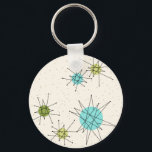 Iconic Atomic Sternexplosion Button Schlüsselanhän Schlüsselanhänger<br><div class="desc">Dieses Iconic Atomic Sternexplosion Button Schlüsselanhänger Muster verfügt über die ikonischen atomaren Sternexplosionen. Das ist richtig! Die alte Schule, der cremefarbene Hintergrund mit goldenen Fesseln ist der perfekte Hintergrund für die lebendigen türkisfarbenen, sanften Sellerie und die kitschigen Birnen grünen Kreise. Die Farbflecken sind sporadisch in verschiedenen Größen platziert, mit überlegenen...</div>