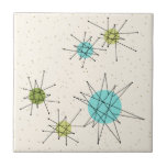 Iconic AtomSternexplosion-kleine Keramik-Fliese Fliese<br><div class="desc">Dieses Iconic AtomSternexplosion-kleine Keramik-Fliesenmuster kennzeichnet iconic AtomSternexplosionen. Das ist recht! Die alte Schule, cremefarbener Hintergrund mit Goldtupfen ist- der perfekte Hintergrund für den vibrierenden Türkis, den beruhigenden Sellerie und farbigen die Kreise des kitschy Birnengrüns. Die Stellen der Farbe werden sporadisch in verschiedene Größen mit der Bedeckung der schwarzen v-förmigen Linien,...</div>